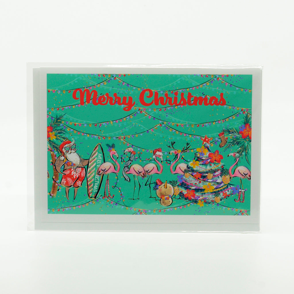 Merry Christmas Notecard with graphics of Santa and Flamingos on the beach