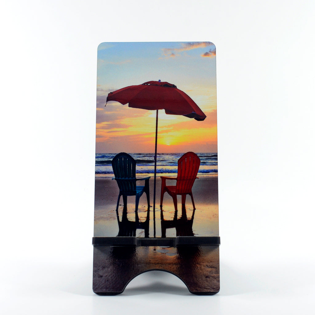2 Chairs on the beach photograph on a phone stand