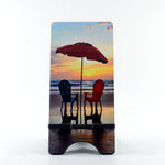 2 Chairs on the beach photograph on a phone stand