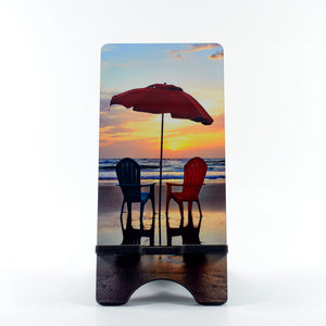 2 Chairs on the beach photograph on a phone stand