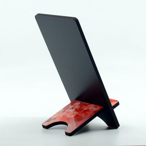 flamingo graphics on a phone stand