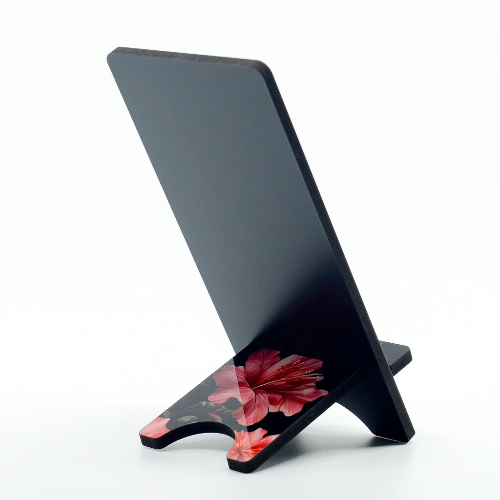 flamingo graphics on a phone stand