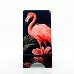 flamingo graphics on a phone stand