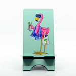 A flamingo at the beach graphics on a phone stand