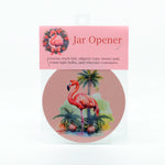 A tropical flamingo merry christmas graphic on a round rubber jar opener