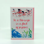 Be a flamingo in a flock of pigeons greeting card