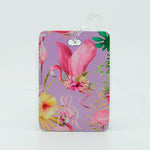 Flamingo image on a bag tag with pink glitter back