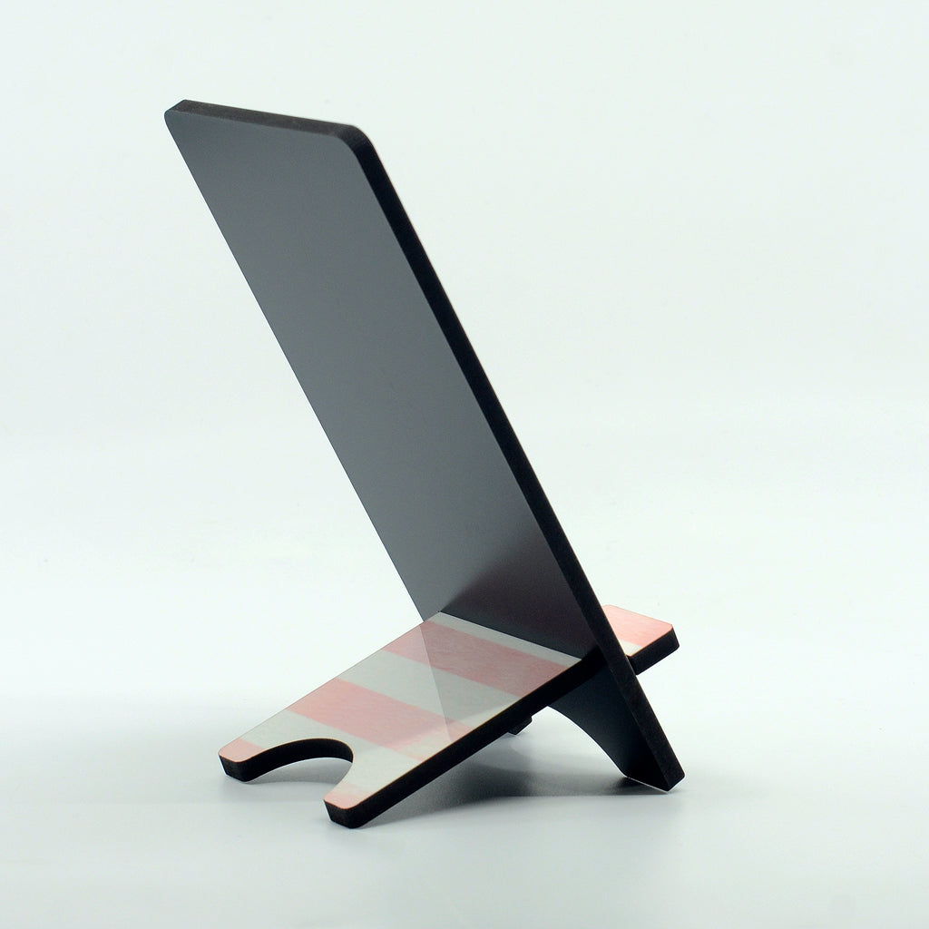 flamingo graphics on a phone stand