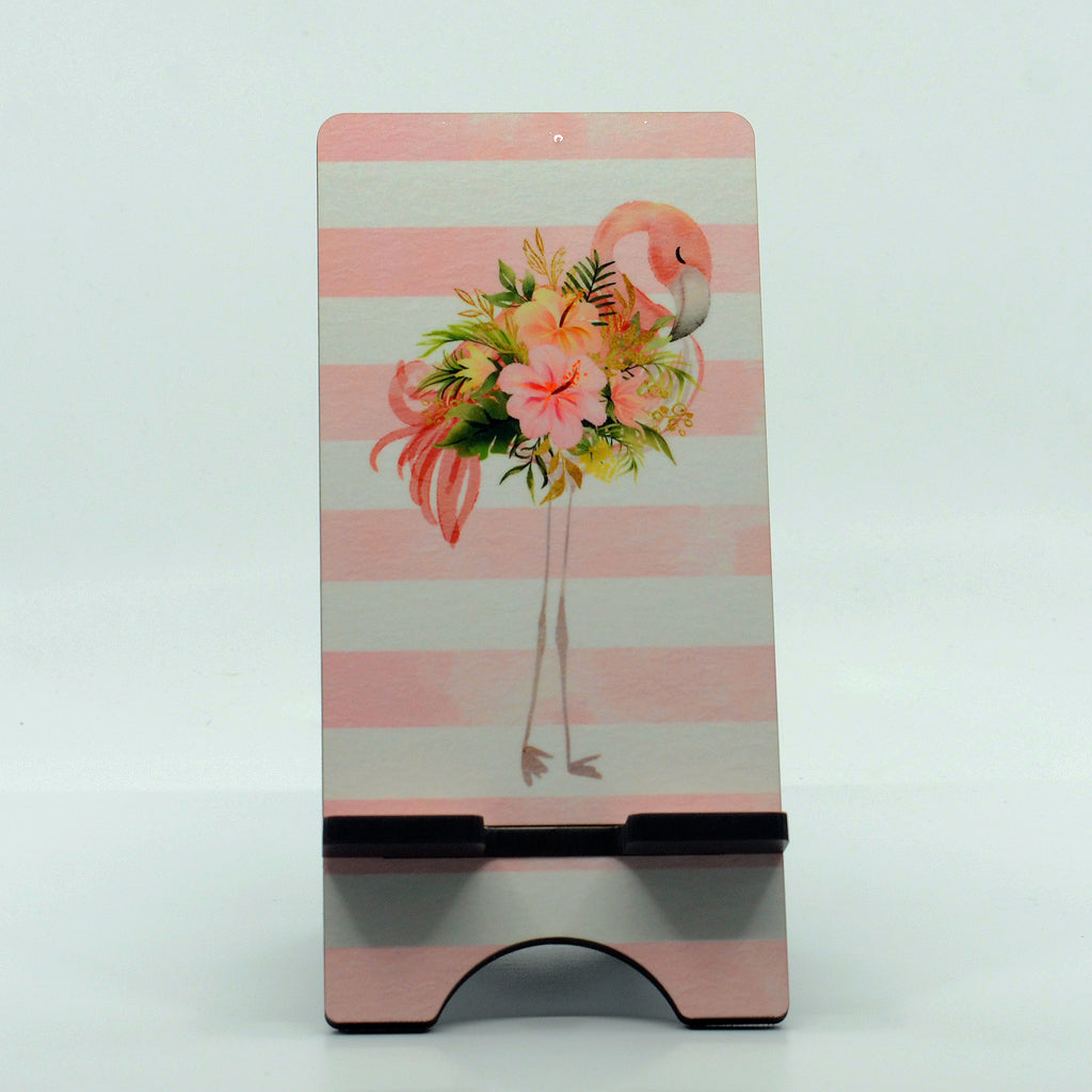 flamingo graphics on a phone stand