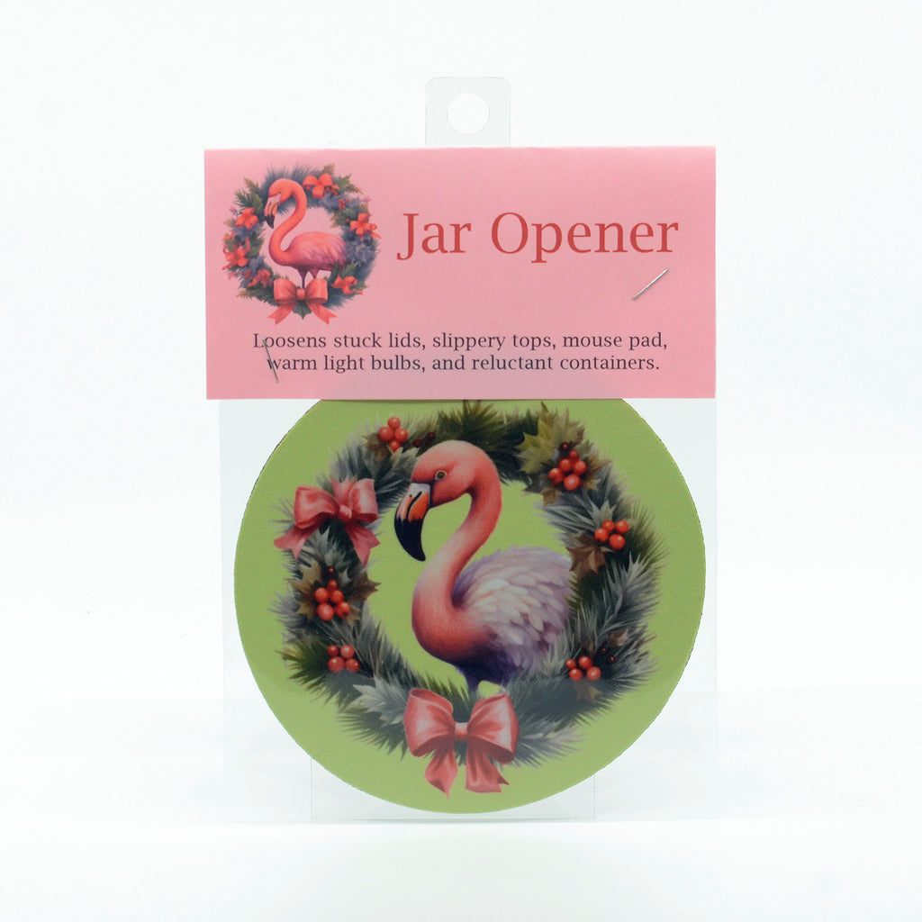 A flamingo with a holiday wreath graphic on a round rubber jar opener