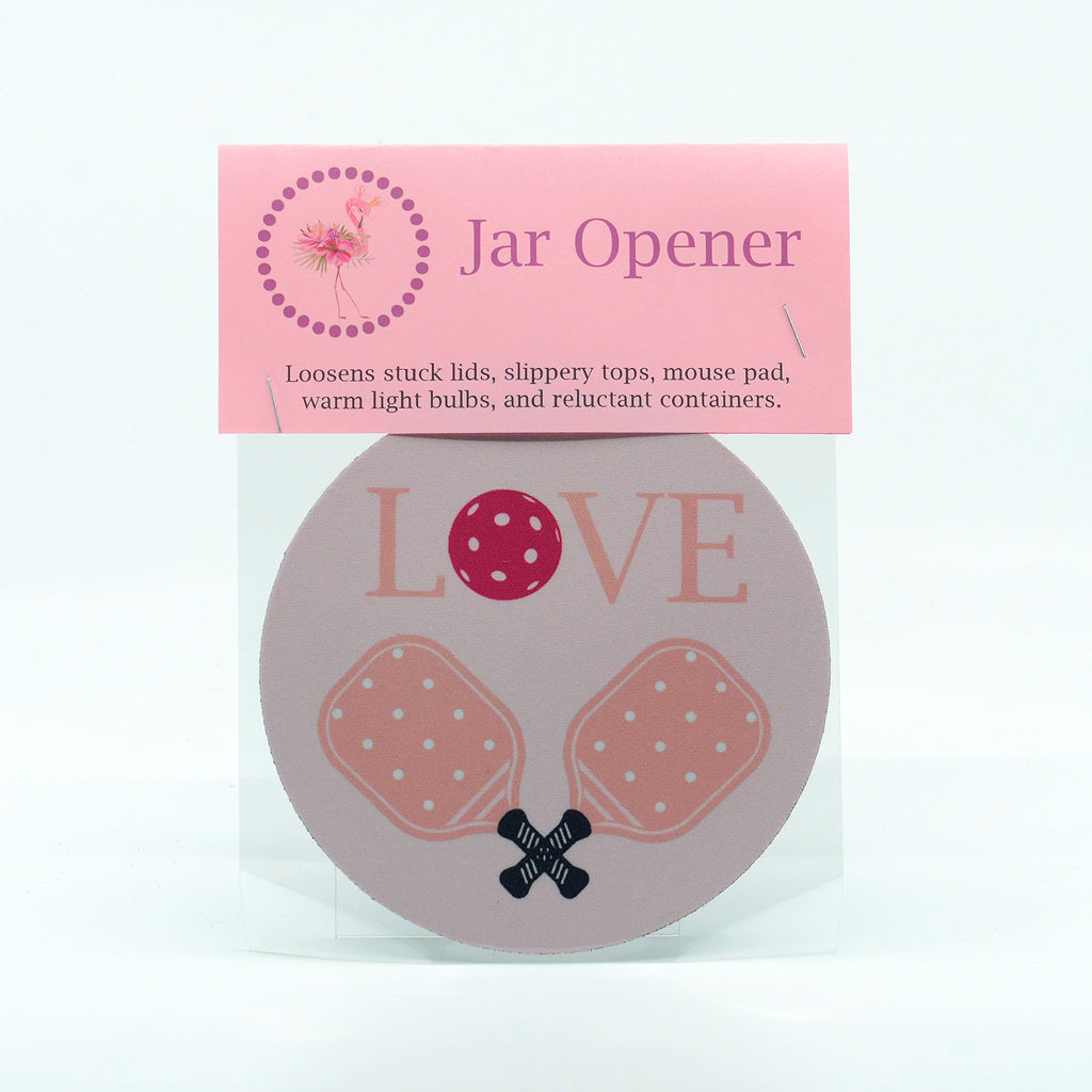 a round rubber jar opener with graphics of pickleball paddle and love