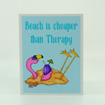 Flamingo in the sand with words Beach is cheaper than therapy on a greeting card