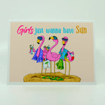 Trio of Flamingos on the beach with words Girls just wanna have Sun on greeting card