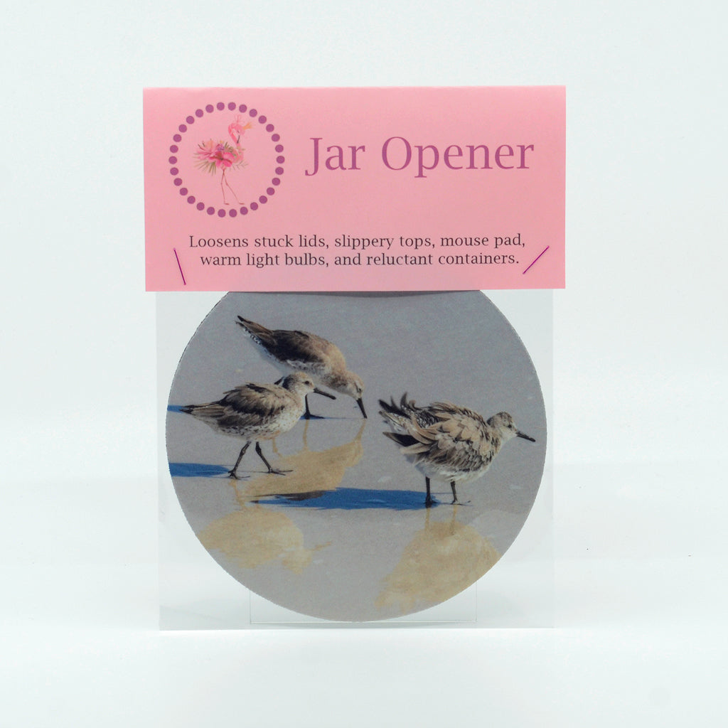 3 shorebirds on the beach photograph on a round rubber jar opener