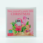 Sandy Christmas Santa Flamingo graphics on a 5"x7" greeting card