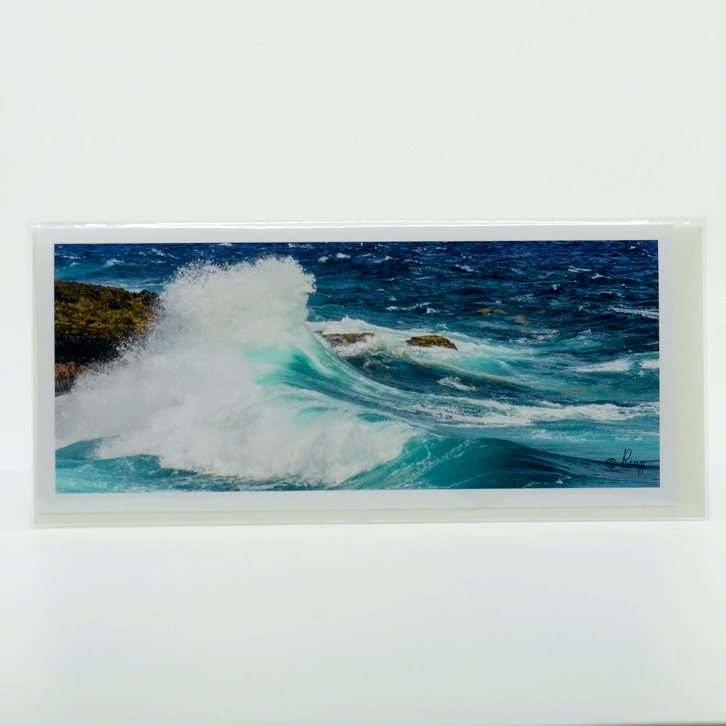 A beautiful wave rushing the shore photograph on a pano greeting card