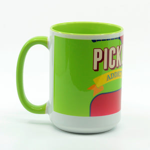 Pickleball Addict graphics on a coffee mug