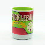 Pickleball Addict graphics on a coffee mug