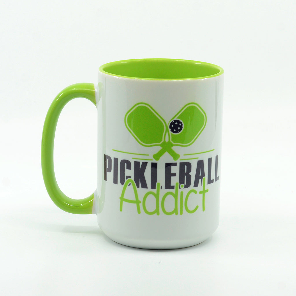 Pickleball Addict graphics on a coffee mug