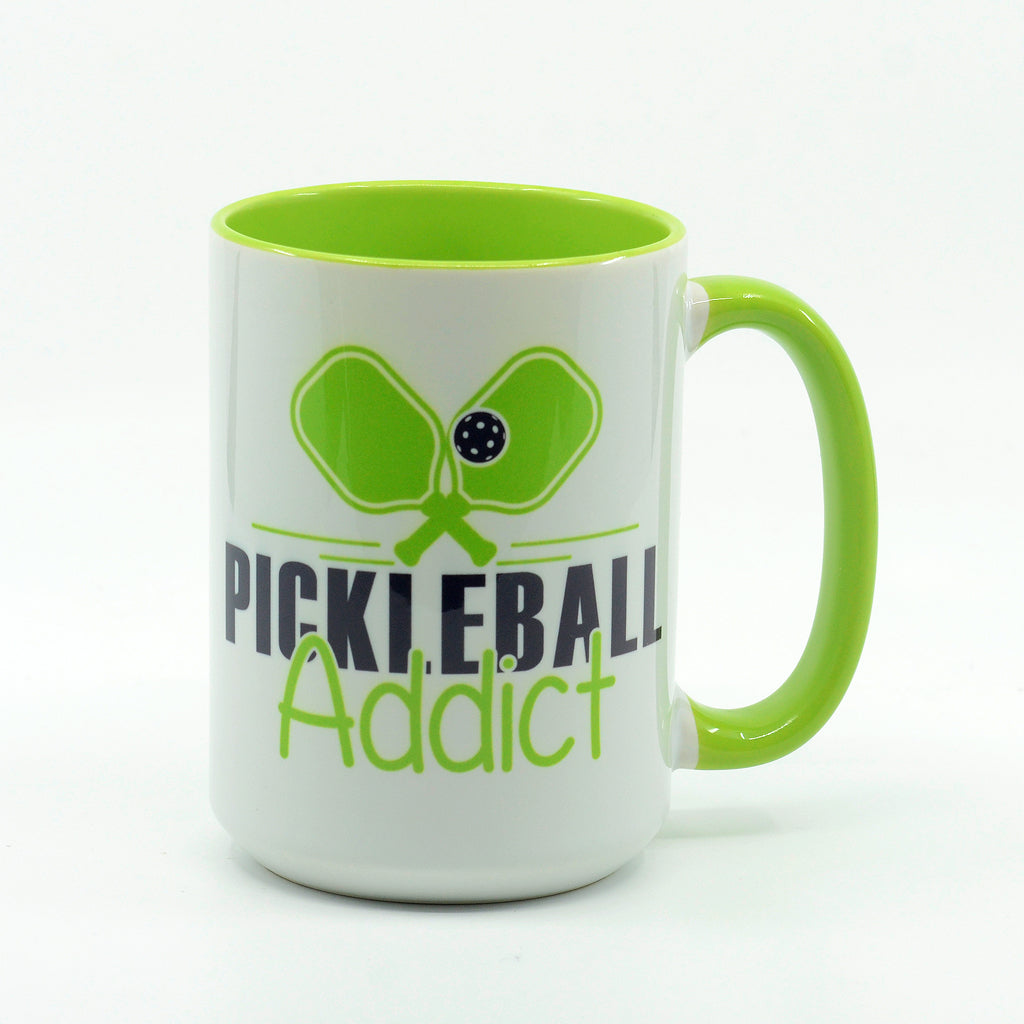 Pickleball Addict graphics on a coffee mug
