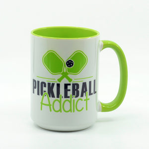 Pickleball Addict graphics on a coffee mug