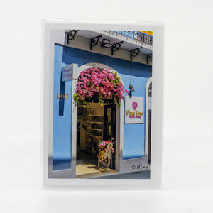 Photograph of Pink Tree Clothing Store in San Juan Puerto Rico on a glossy greeting card