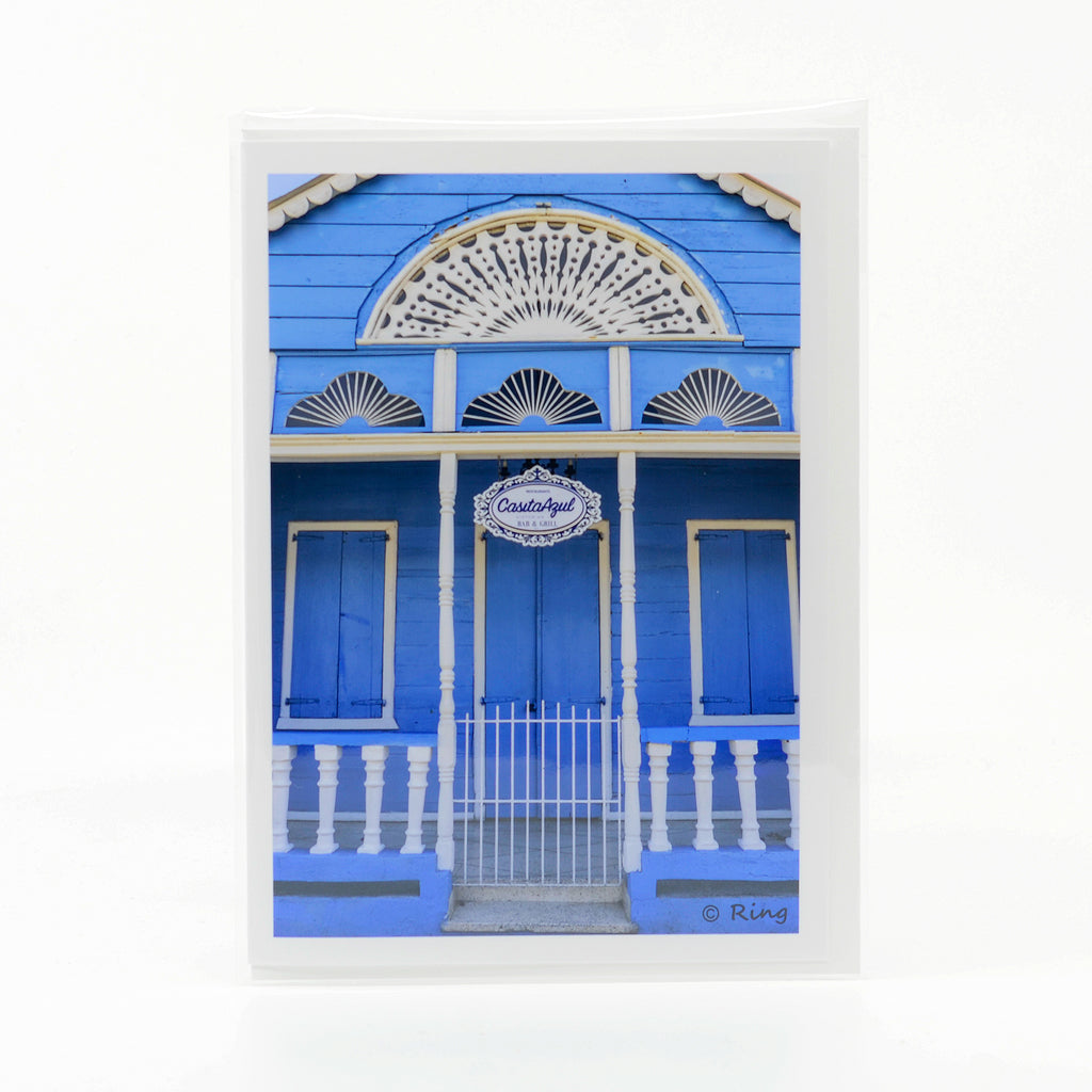 Photograph of Blue Building in Puerto Plata Dominican Republic on a glossy greeting card