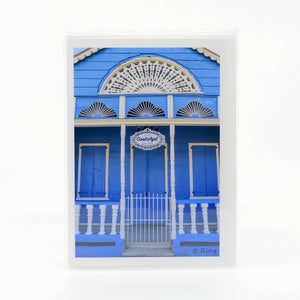 Photograph of Blue Building in Puerto Plata Dominican Republic on a glossy greeting card