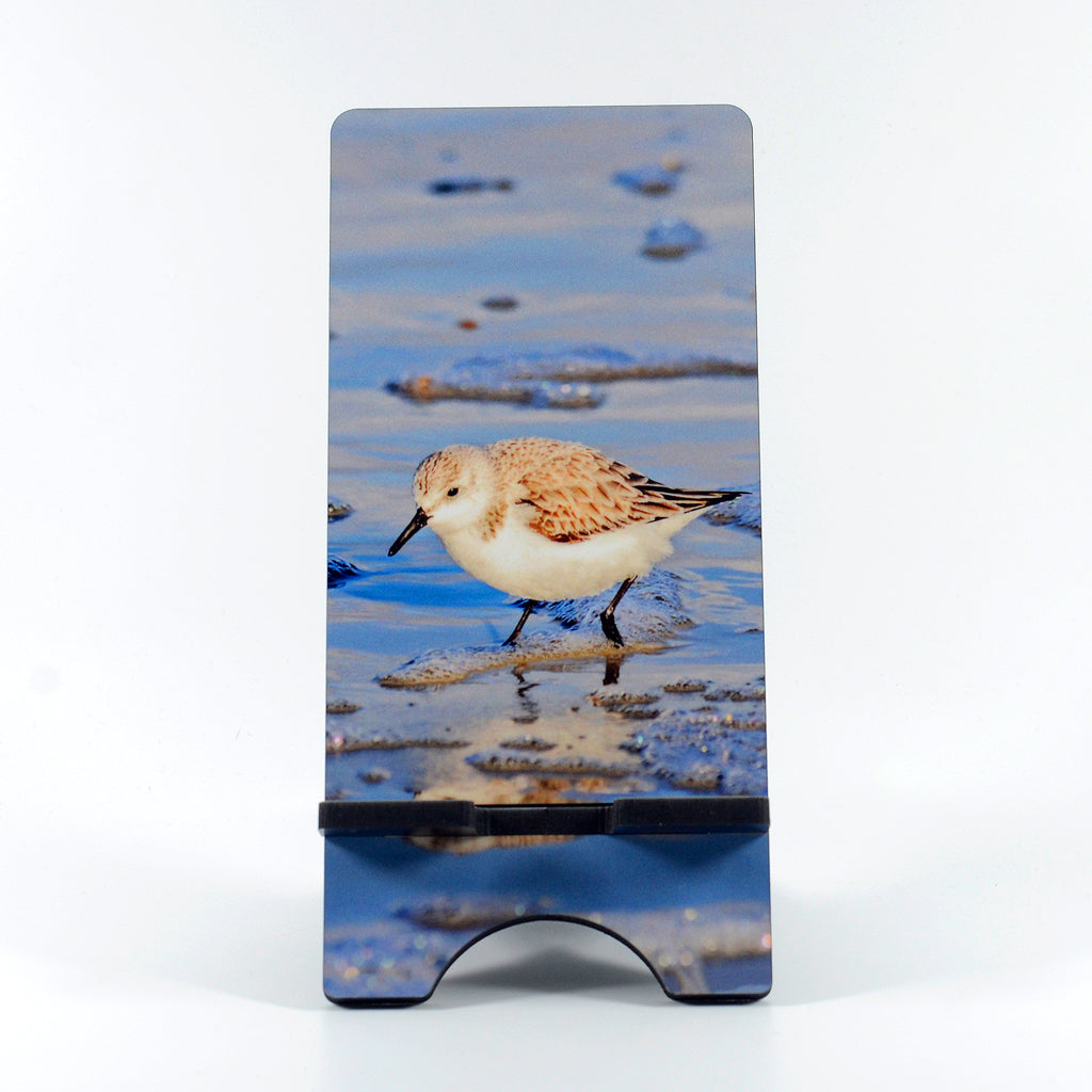 Sanderling in the Ocean Sea photograph on a phone stand