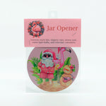 A santa and flamingo at the beach graphics on a round rubber jar opener