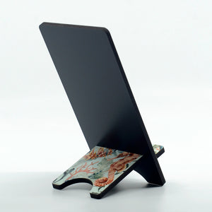 Seahorse graphic on a phone stand