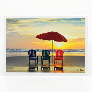 Three beach chairs on the beach at sunrise on a 5"x7" glossy greeting card