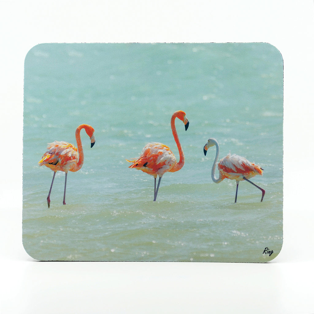 three flamingos in a salt pan photograph on a rectangle rubber mouse pad