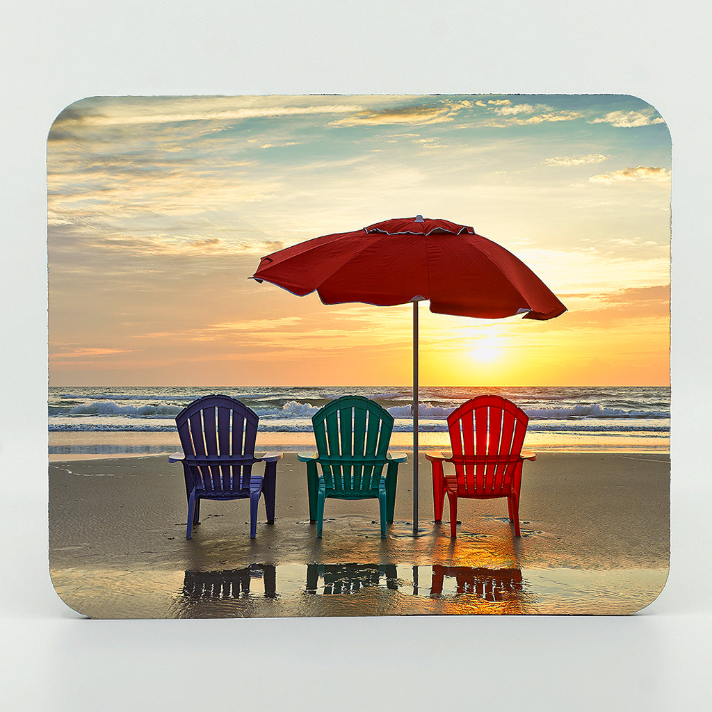three beach chairs and umbrella on the beach on a rectangle rubber mouse pad