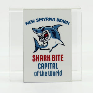 A rectangle magnet with a Shark-New Smyrna Beach Shark Bite Capital of the World