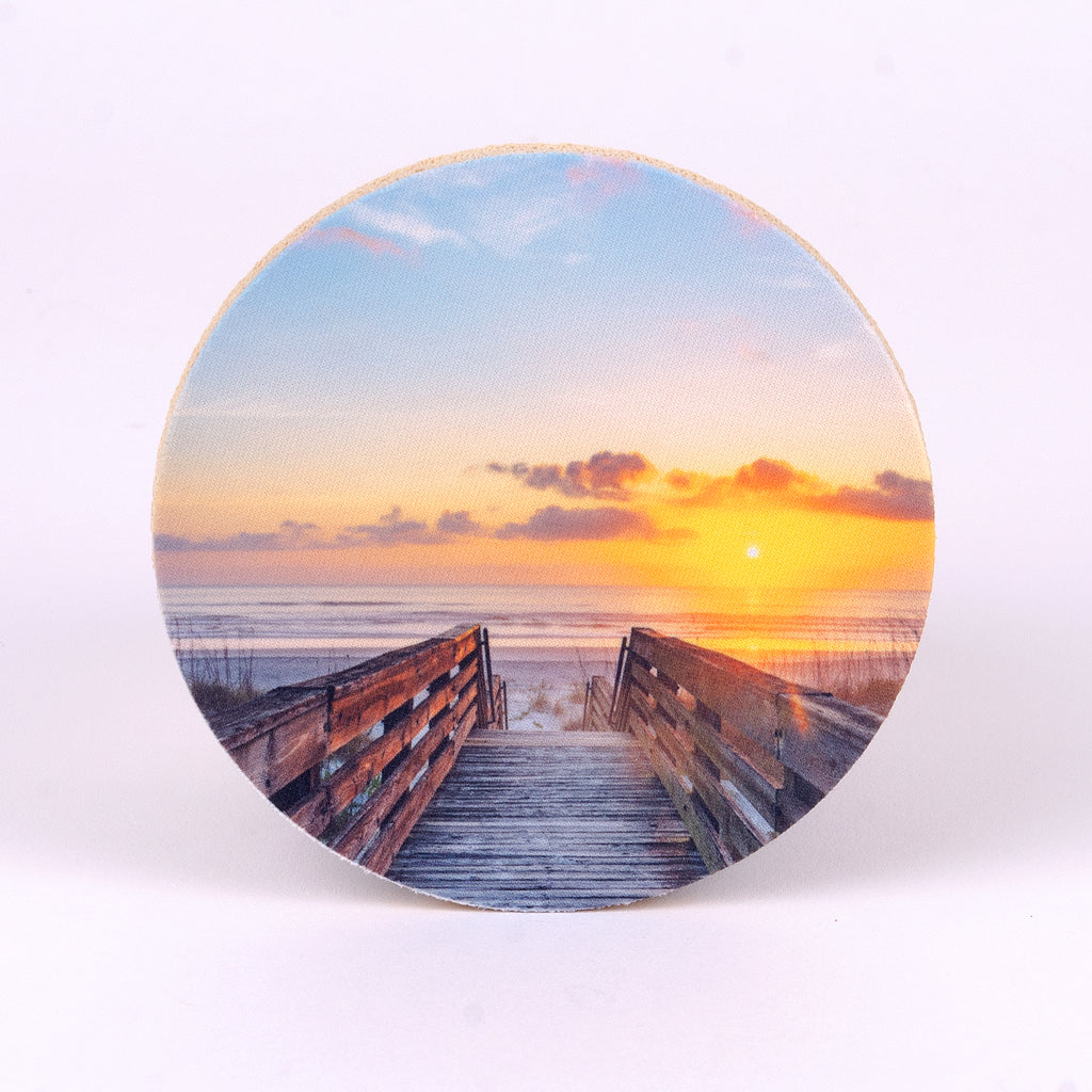 4" round rubber coaster with beach boardwalk  entrance