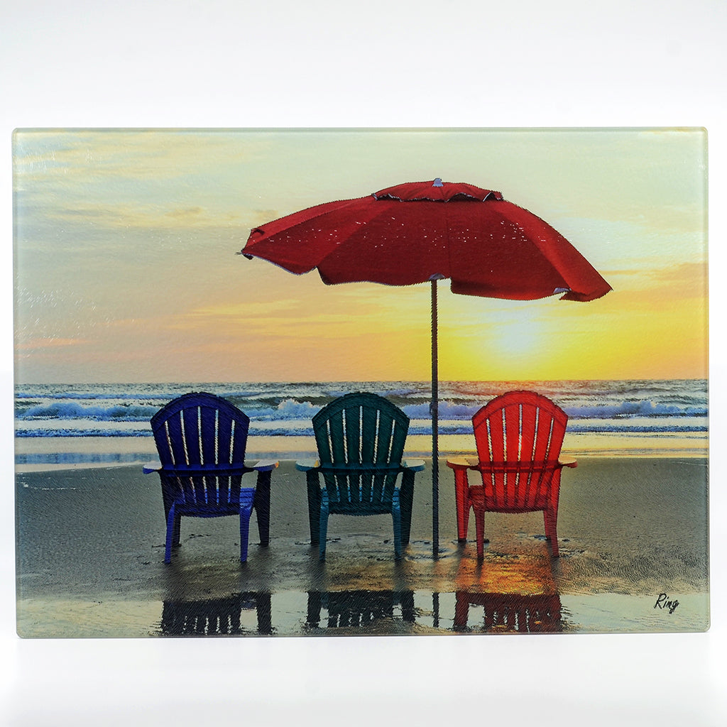 Tempered Glass Small Rectangle Cutting Board with 3 beach chairs on the beach