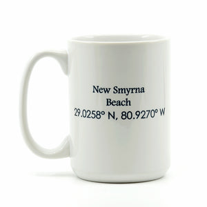 15 ounce white ceramic coffee mug with Sea Turtle on the beach with New Smyrna Beach LAT and LONG