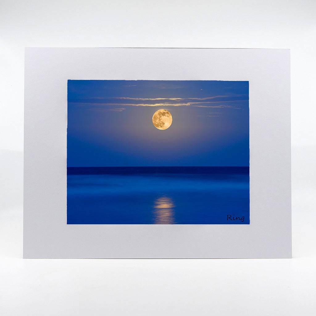 A super moon over the ocean photograph by Mike Ring