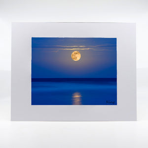 A super moon over the ocean photograph by Mike Ring